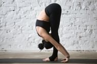 Padahatasana yoga for belly fat. (Image via Freepik)